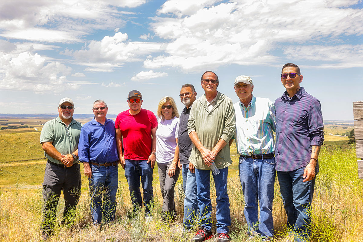 Group standing in field